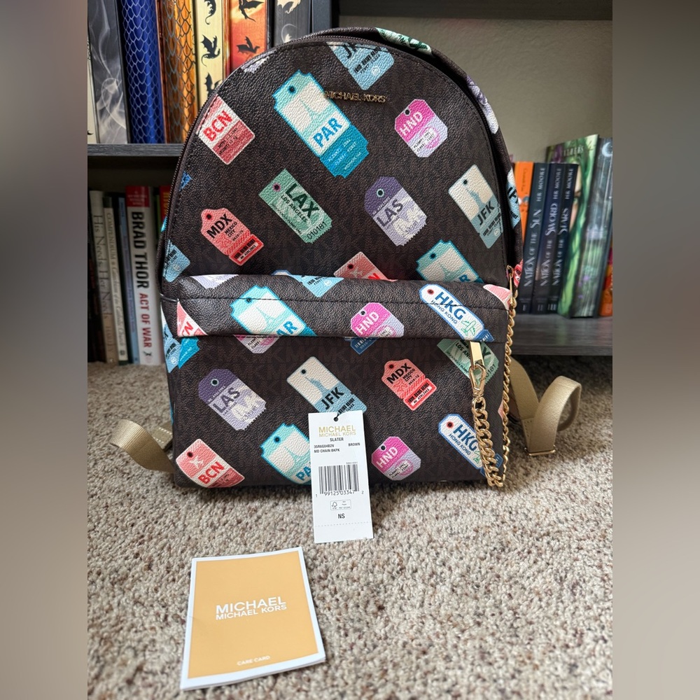Michael Kors medium travel themed backpack